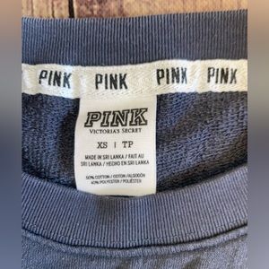 Pink long sleeve shirt.